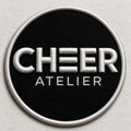 Round embroidered patch — Cheer Atelier logo patch example