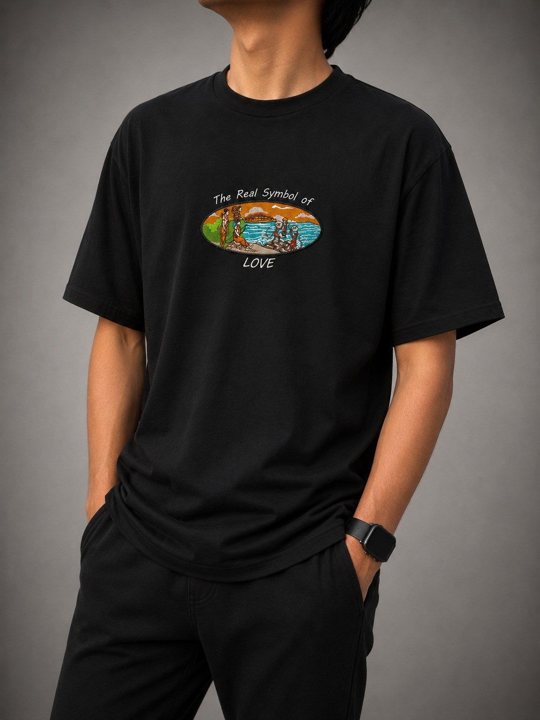 Model wearing the black Ram Setu embroidered oversized tee